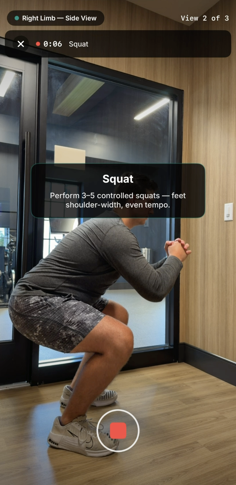 KinoIQ Clinical recording a squat from the right sagittal view, with on-screen movement instructions
